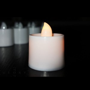 ENFEITE VELA DE PLASTICO COM LED 3,5 X 4,3 CM LUZ AMARELA BOX C/ 24 PEÇAS